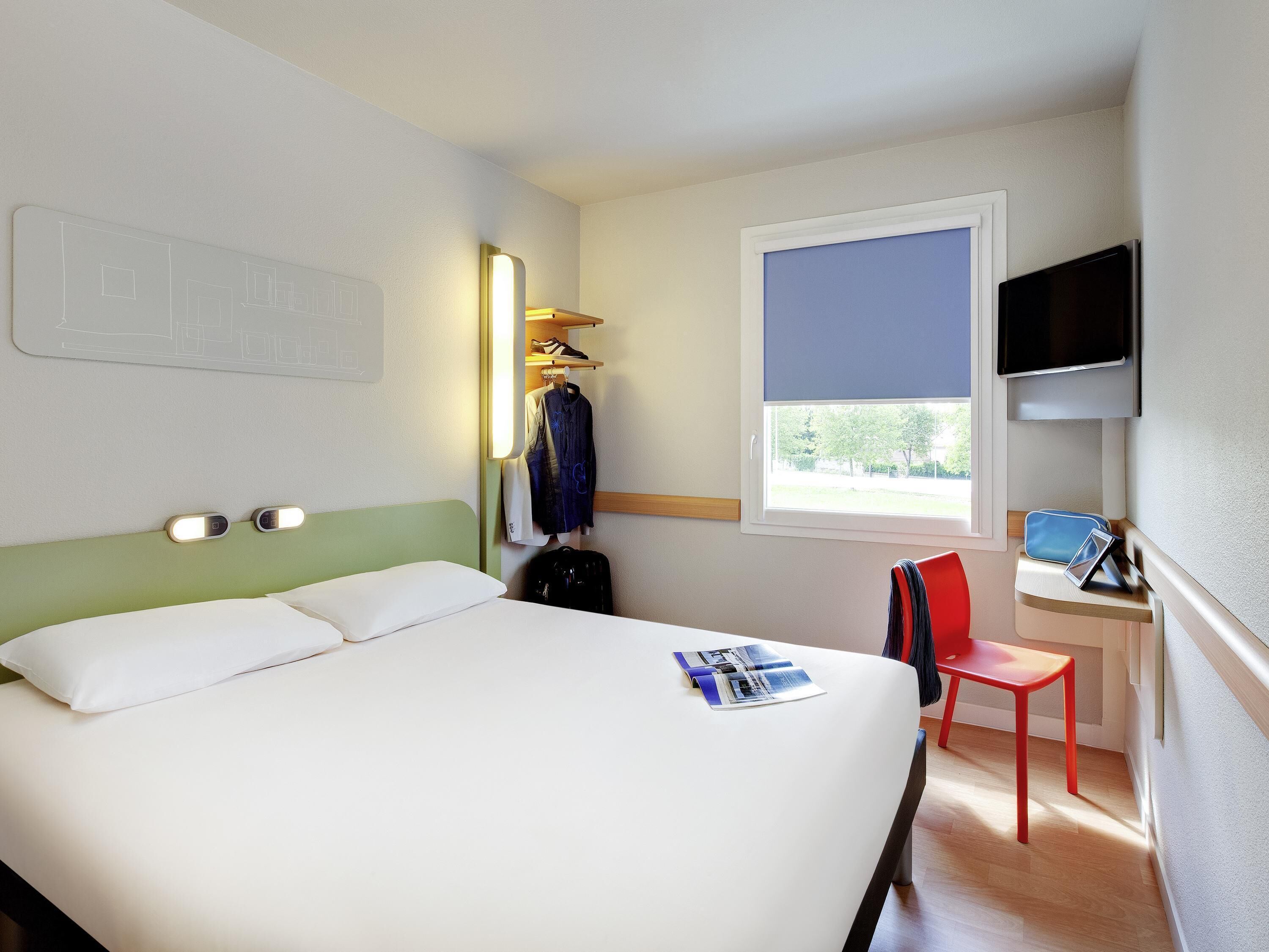 Habitación doble | Escritorio, cortinas blackout, cunas gratuitas y wifi gratis 