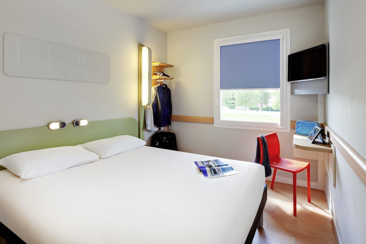 Habitación doble | Escritorio, cortinas blackout, cunas gratuitas y wifi gratis