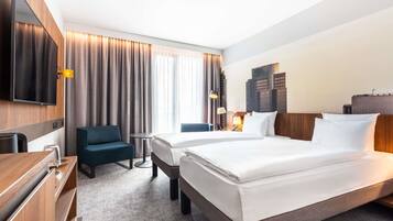 Ropa de cama hipoalergénica y minibar con artículos gratuitos