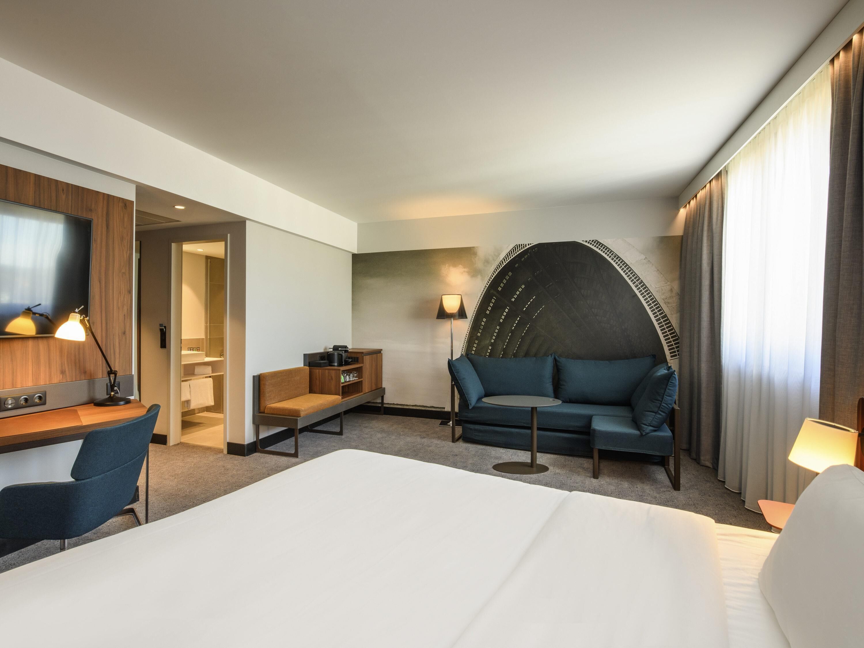 Executive kamer, 1 tweepersoonsbed met slaapbank | Hypoallergeen beddengoed, een gratis minibar, een kluis op de kamer