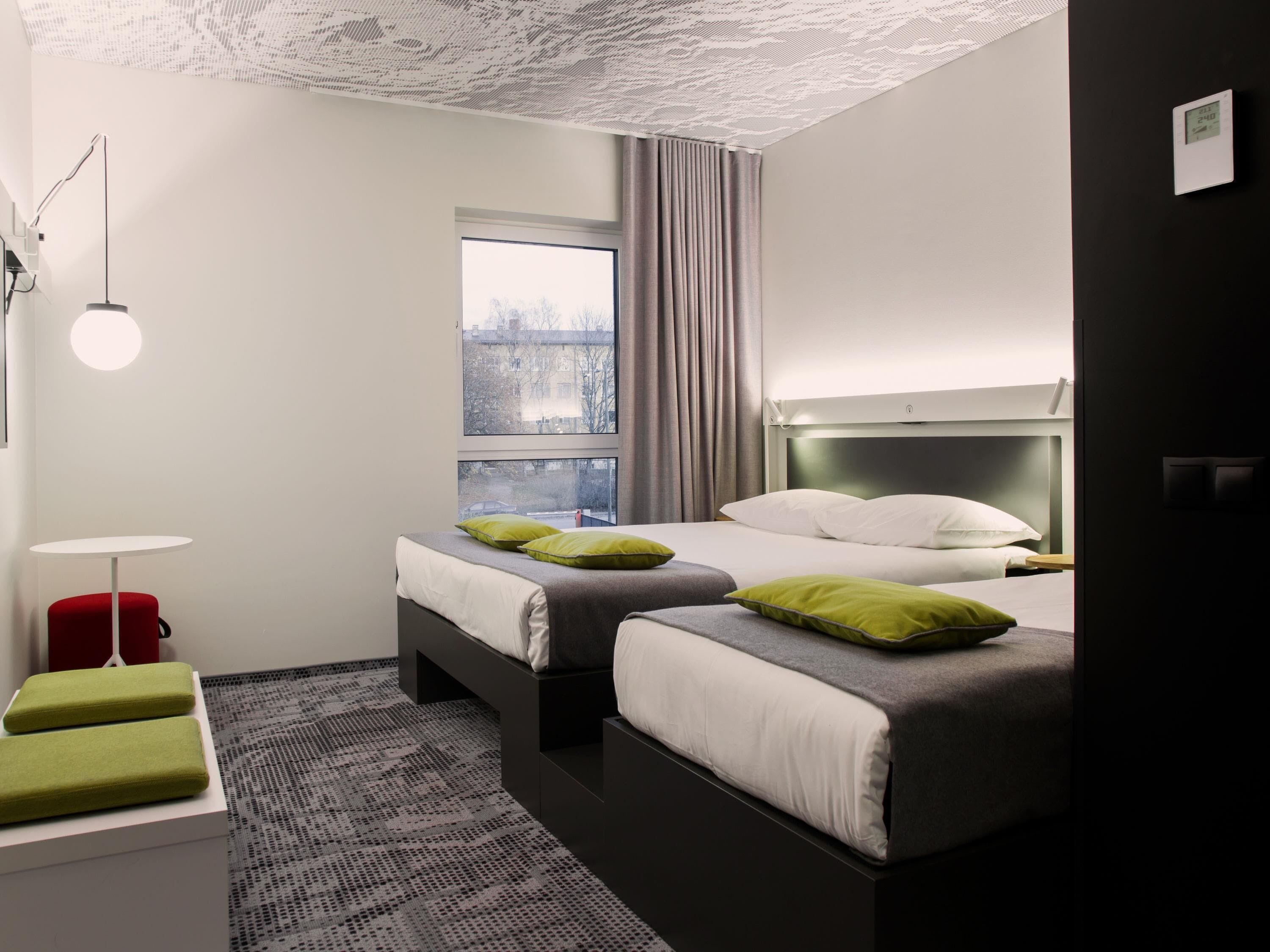 triple room, multiple beds | in-room safe, blackout curtains, soundproofing, iron/ironing board