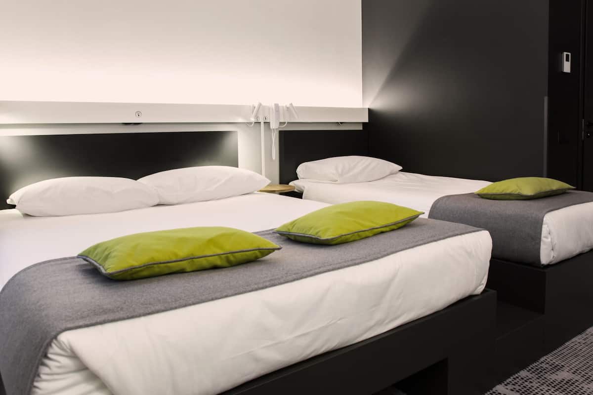 triple room, multiple beds | in-room safe, blackout curtains, soundproofing, iron/ironing board