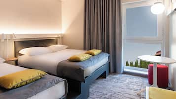 Triple Room, Multiple Beds | In-room safe, blackout drapes, soundproofing