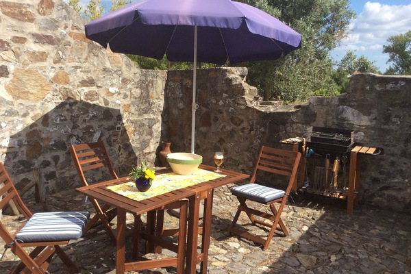 Small yard, with barbecue.