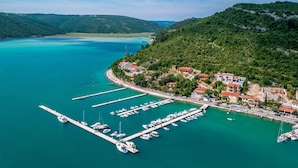 A coastal town with a marina, boats, and buildings. - Wonderful private villa for 8 people with pool, A/C, WIFI, TV and terrace (Valhova)