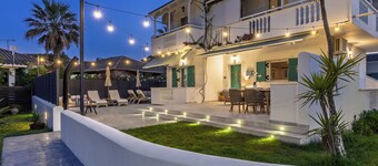 Tasos Villas - Huoneisto nro 1 - Tilava pohjakerroksen huoneisto puutarha-alueella