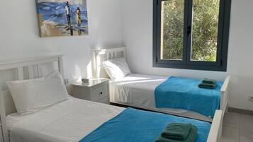 2 dormitorios, tabla de planchar con plancha, wifi y ropa de cama
