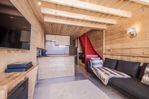 Ledtelevisie, een dvd-speler en boeken