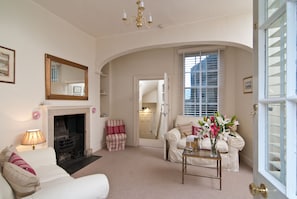 Smart TV, fireplace, DVD player, books