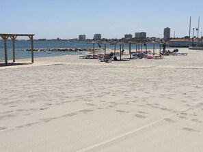 Perto da praia, toalhas de praia 