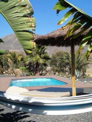 Outdoor pool, a heated pool - VILLA FUERTEVENTURA. With fantastic sea views. Climatized pool. (Tarajalejo)
