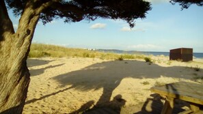 Una playa cerca, toallas de playa