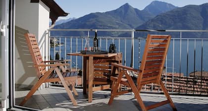 Bella casa vicino al mare con vista panoramica sul lago e sulle montagne