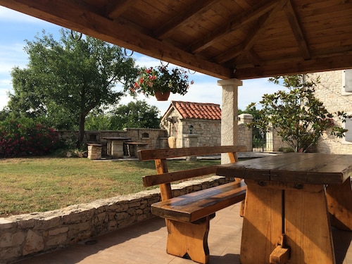 Rustic farmhouse surrounded by the greenery of the large and spacious garden ... with swimming pool