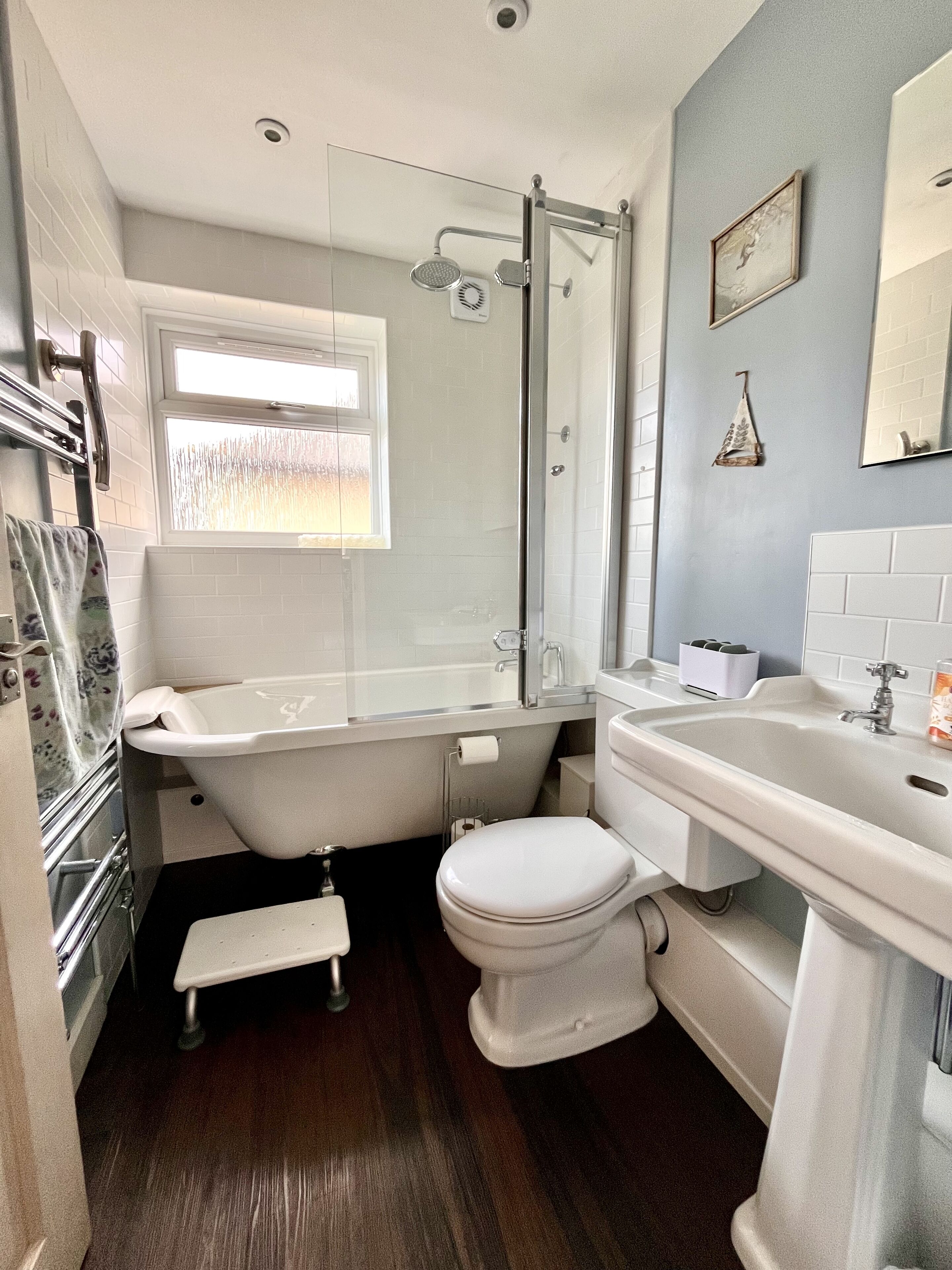 Combined shower/bathtub, hair dryer, towels, toilet paper