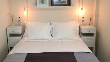 2 habitaciones, tabla de planchar con plancha y cuna de viaje