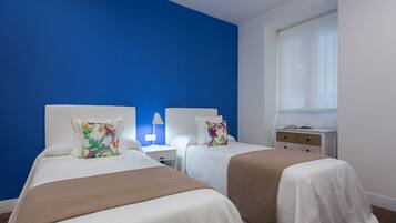 2 habitaciones, tabla de planchar con plancha, wifi y ropa de cama