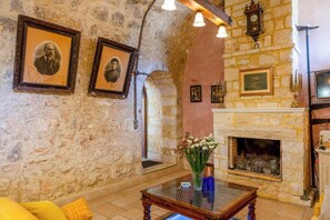 TV, fireplace, books, stereo