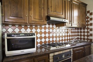 Fridge, oven, cookware/dishes/utensils