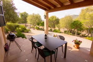 Outdoor dining - Beautiful country house with private pool surrounded by nature and tranquility (Son Servera)