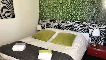 2 slaapkamers, een strijkplank/strijkijzer, gratis wifi, beddengoed