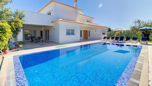 A modern two-story house with a swimming pool, outdoor seating, and a garden. - Villa Marazul Quinta Amizade w/ Sea View, Games room, Salt pool (Guia)