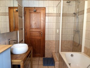 Bathtub, hair dryer, towels
