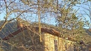 A stone building with a sloped roof, a small window, and a door. There is a paved path leading to the entrance. - Beautiful  farmhouse  with pool and stunning infinite sea views. Host up to 9 (bordighera)