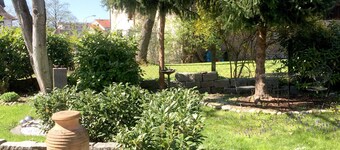 Vacation home Köchlin - charming semi-detached house with garden and parking space