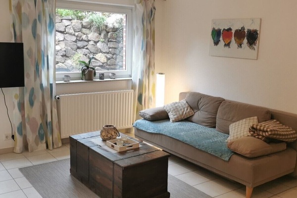 Wohnzimmer mit Schlafsofa