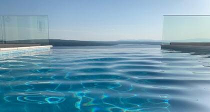 Exclusive new 5 * villa with panoramic sea view and heated pool