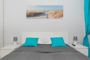 1 habitación, tabla de planchar con plancha, wifi y ropa de cama 