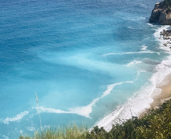 Beach nearby, sun loungers
