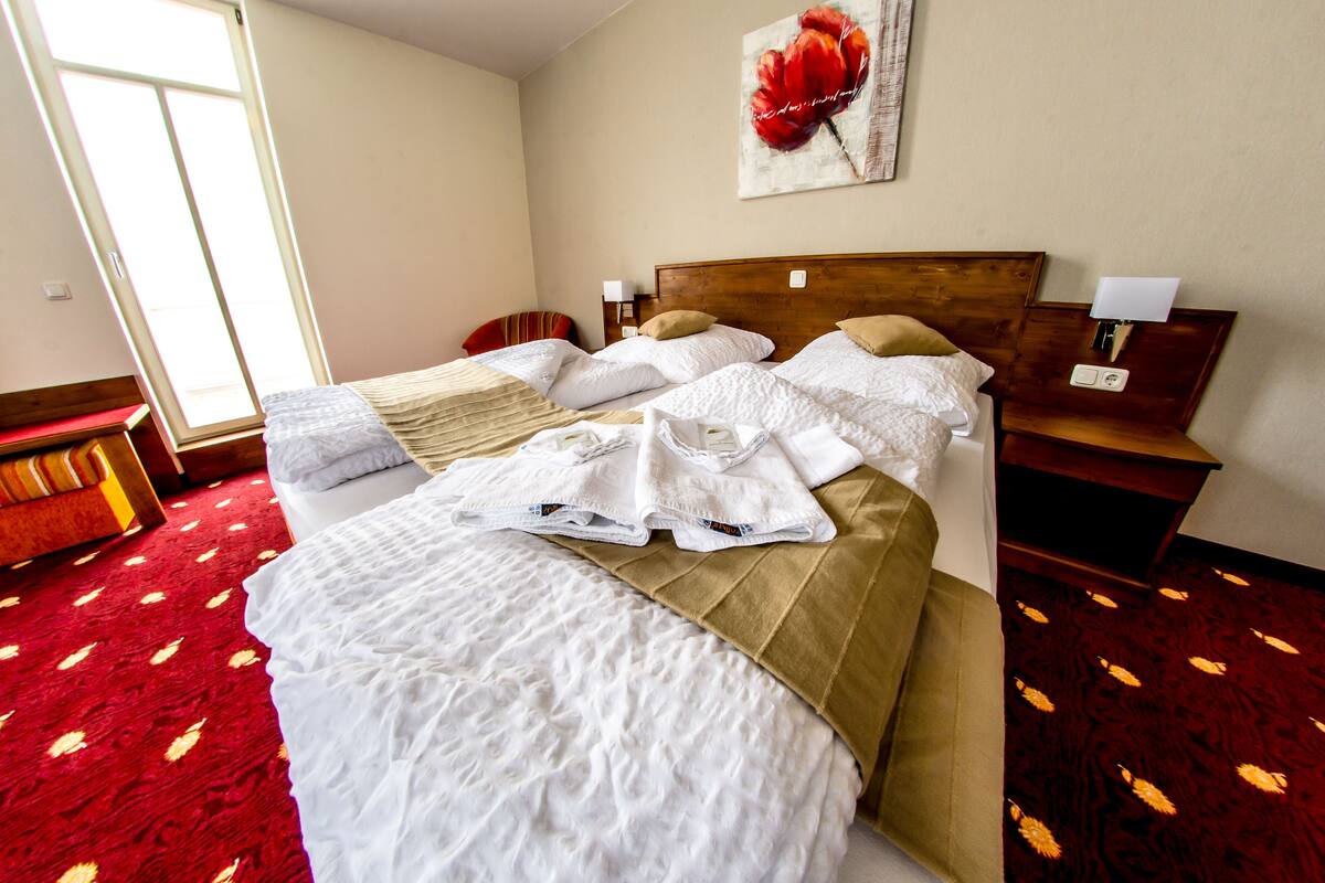 Hypo-allergenic bedding, desk, blackout curtains, soundproofing
