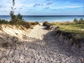 Beach nearby, sun loungers