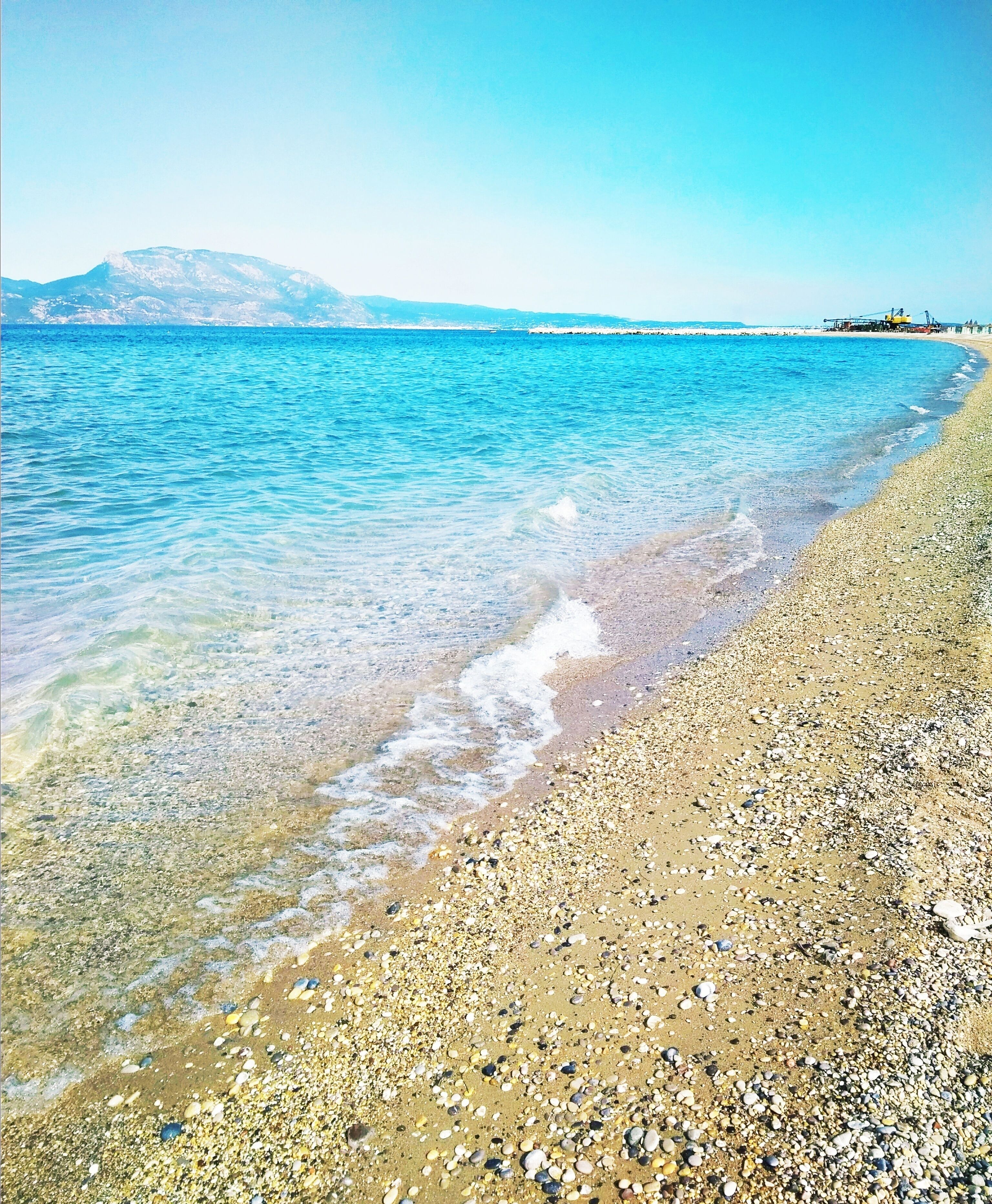 Ligstoelen aan het strand, strandlakens