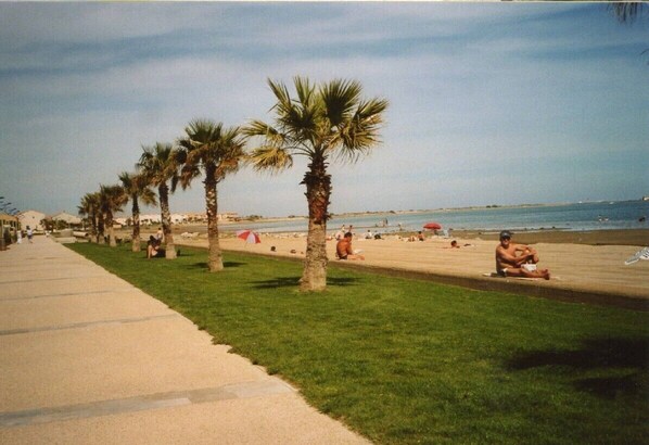 On the beach, sun loungers