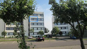 Exterior - Your apartment with a wonderful panoramic view of the Burgtiefe marina (Fehmarn)