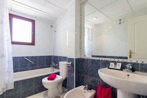 Hair dryer, towels, shampoo