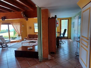TV, fireplace, books, offices