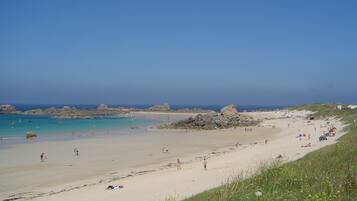 On the beach, sun-loungers, beach towels