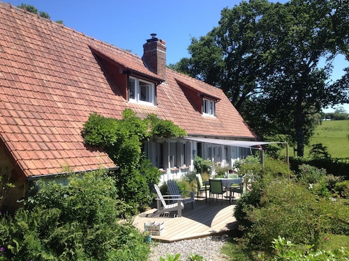 authentic Norman half-timbered house with landscaped park near woods and sea