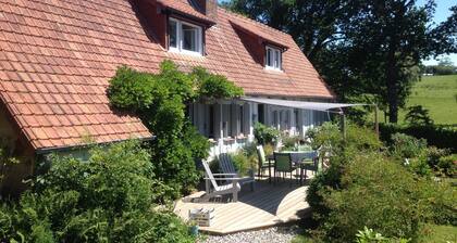 authentic Norman half-timbered house with landscaped park near woods and sea
