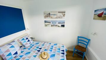 1 slaapkamer, een strijkplank/strijkijzer, wifi