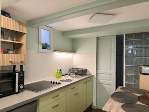 Fridge, microwave, stovetop, coffee/tea maker