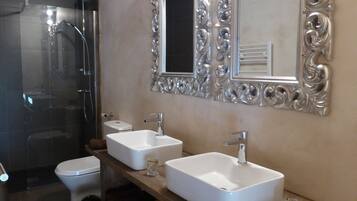 Bathtub, hair dryer, towels, soap