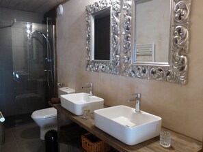 Bathtub, hair dryer, towels, soap