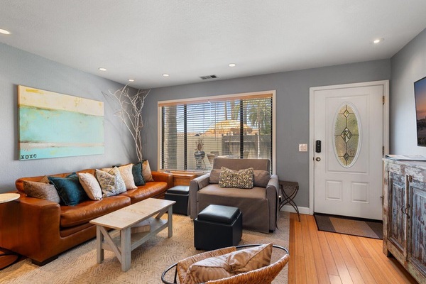 The open floor plan of this lovely home is perfect for enjoying time with friends and family