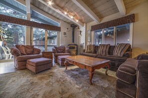 Expanded outdoor eating area off family room with gas grill