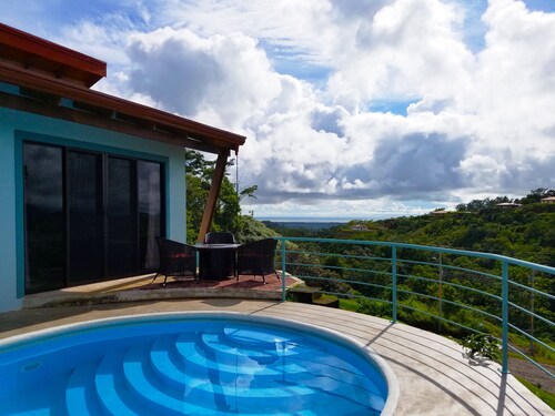 Luxury Mountain Home with Ocean and Rain Forest Views.  Newly tiled pool!